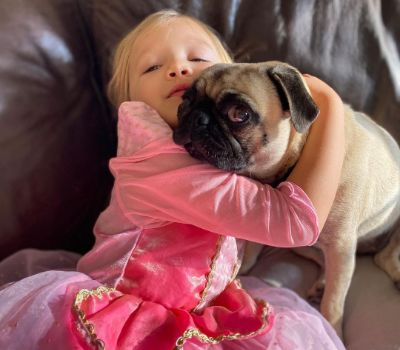 Photo of Dawni Sahanovitch's cute dog and daughter.